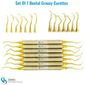 Set of 7 Gracey curettes with gold hollow handles for subgingival scaling and root planing